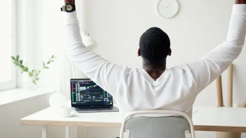 Man celebrating forex win Stock Footage 238832340