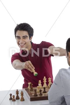 Man celebrating his success after winning chess game Stock-Fotos