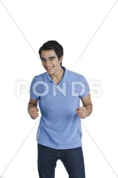 Man celebrating his success and smiling Stock Photos