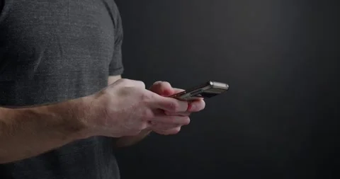 Man on Cell Mobile Smart Phone Texting Typing Scrolling Social Media Stock Footage 295513757
