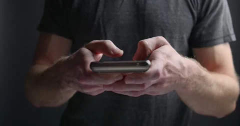 Man on Cell Mobile Smart Phone Texting Typing Scrolling Social Media Stock Footage 295513976