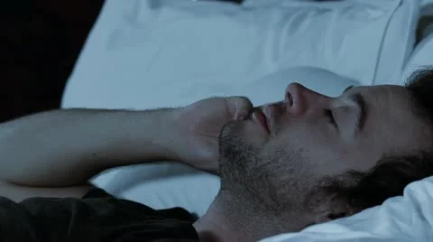Man on cell phone in bed V2 - HD Stock Footage 12236193