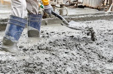 Man Cementing Road Stock Photos