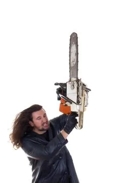 Man with chainsaw in rage Stock Photos