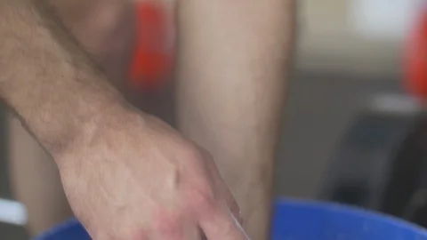 Man chalking hands before workout. slow motion Stock Footage 114138098