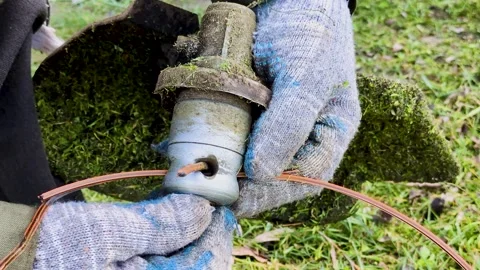 The man changes the cord Stock Footage 306573420