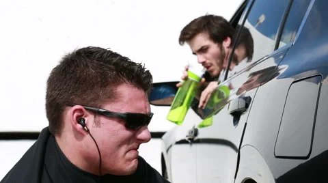 Man changes his tire Stock Footage 46866819