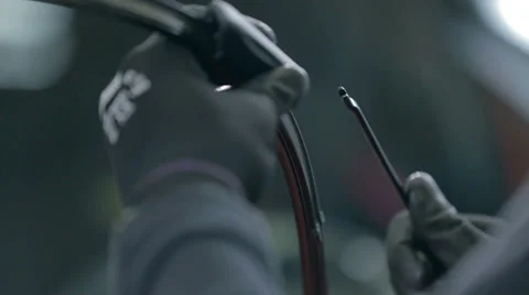 Man changes the rubber on a wiper Video stock 34650226