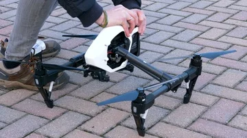 Man that changing battery in a drone Stock Footage 85784036