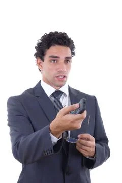 Man changing channel with remote Stock Photos