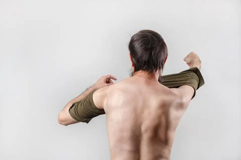 Man changing clothes Stock Photos