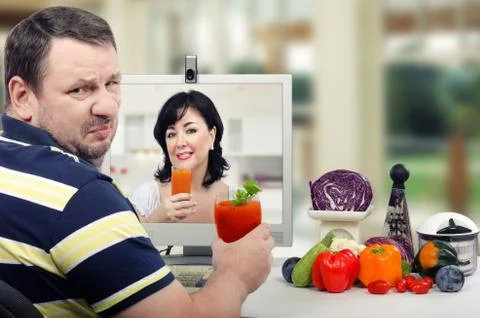 Man changing his mind to try detox drink Foto stock