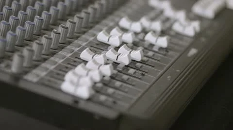 Man changing settings on a mixing console 库存影片 21240797