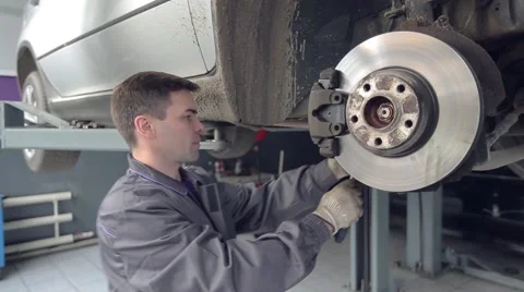 Man Changing Shoe of Brake Stock Footage 62166669