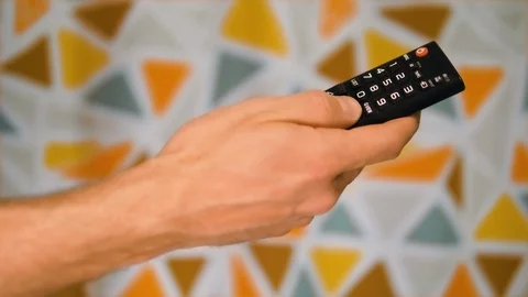 Man channel surfing Stock Footage 90868136