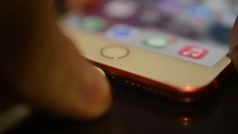 Man charge the battery of the iphone mobile phone. plug battery charge cable. Video stock 231408132