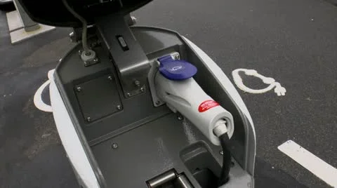 Man Charges Electrical Vehicle ED Stock Footage