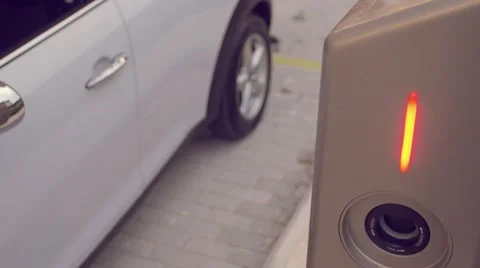 Man charging its electric car Stock Footage 62226558