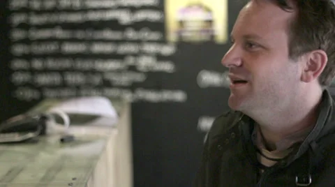 Man chats at bar 库存影片 35143485