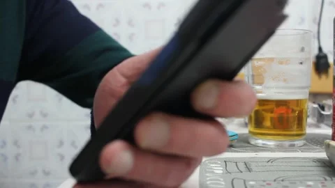 Man chatting on his mobile Stock Footage 241440995