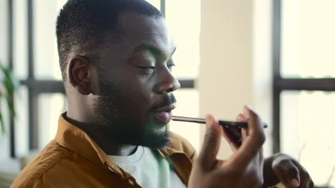 Man chatting online and using smartphone during working day at home office. Stock Footage 158982076