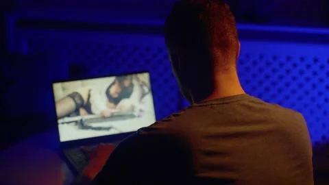 Man chatting with webcam model late at night. Stock Footage 154277708