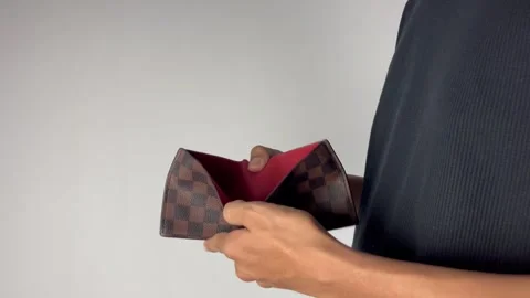 A man check a empty wallet, no money expression Stock Footage 314537401