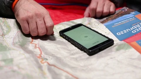 Man check the paper map Video stock 84310693