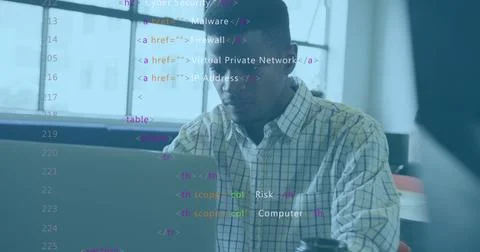 Man in checked shirt analyzing HTML code snippets using open laptop in office, Stock Photos