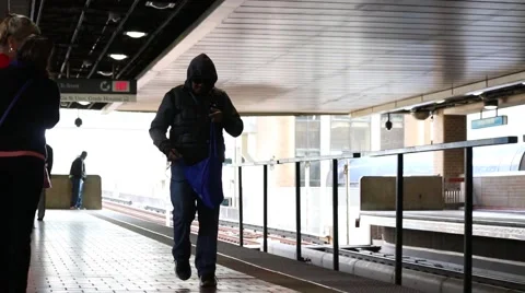Man checkin bag walking through marta station Stock Footage 45181486