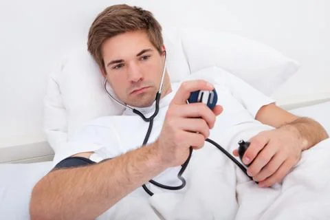 Man checking blood pressure Stock Photos