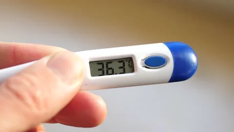 Man Checking Body Temperature at Home, Covid Pandemic Stock Footage 146227499
