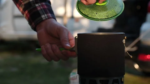 Man Checking Boiling Water In Kettle On Camping Gas Stove Stock Footage 341588233