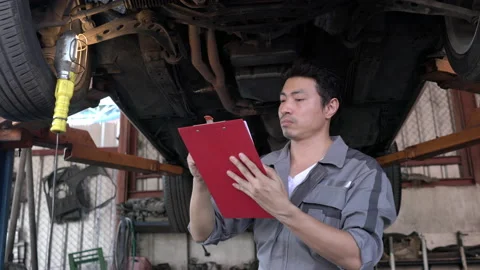 Man checking car Stock Footage 172181173