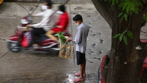 Man-checking-change-after-shopping Stock Footage 137839506