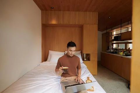 Man Checking Code on Laptop Screen Stock Photos