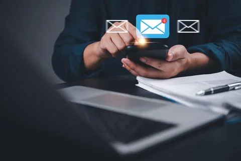 Man checking email alert pops up on smartphone with notification icon. Digi.. Stock Photos