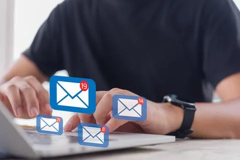 Man checking email icon online or sending mail to partner and customer on w.. Stock Photos