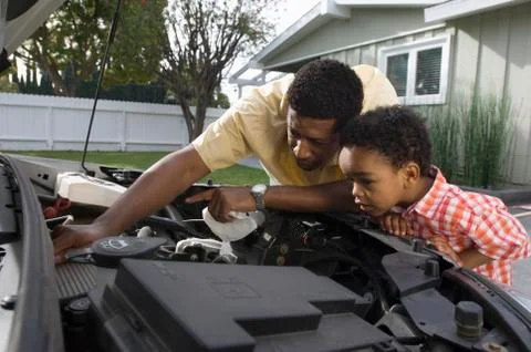 Man Checking The Engine Of Car Stock Photos