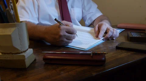 Man checking file record in his office desk Stock Footage 56735522