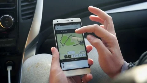Man checking GPS map on his smartphone. Stock Footage