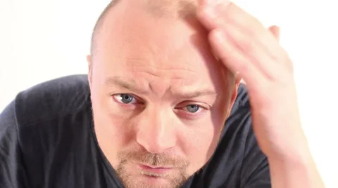 Man checking hair line in Mirror Stock Footage 47030206