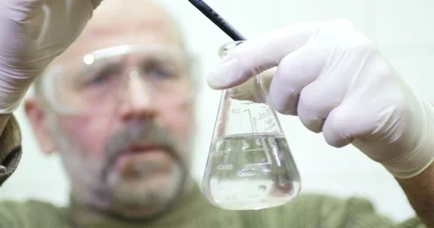 A man checking the hardness of the water Stock Footage 50927799