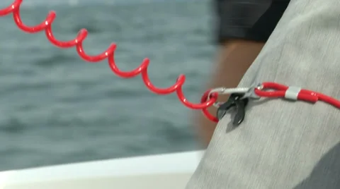 Man checking his kill cord Stock Footage 36920271