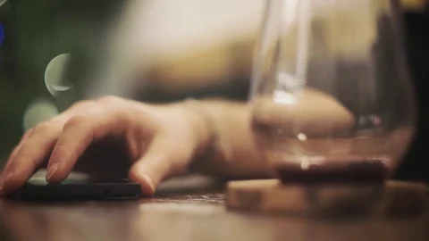 Man Checking His Smartphone At Bar Stock Footage 73884853