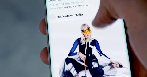 Man Checking Instagram On A Modern Smartphone Stock-Footage 87359583