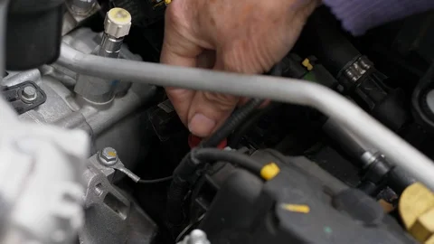 Man Checking The Oil of The Car, Close Up Stock Footage 125522152