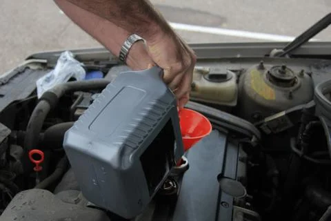 Man checking the oil level 스톡 사진