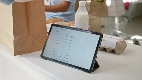 Man Checking Online Grocery Delivery Order on Digital Tablet Stock Footage 346066866
