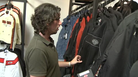 Man Checking Out Harley Jacket Video stock 45496674